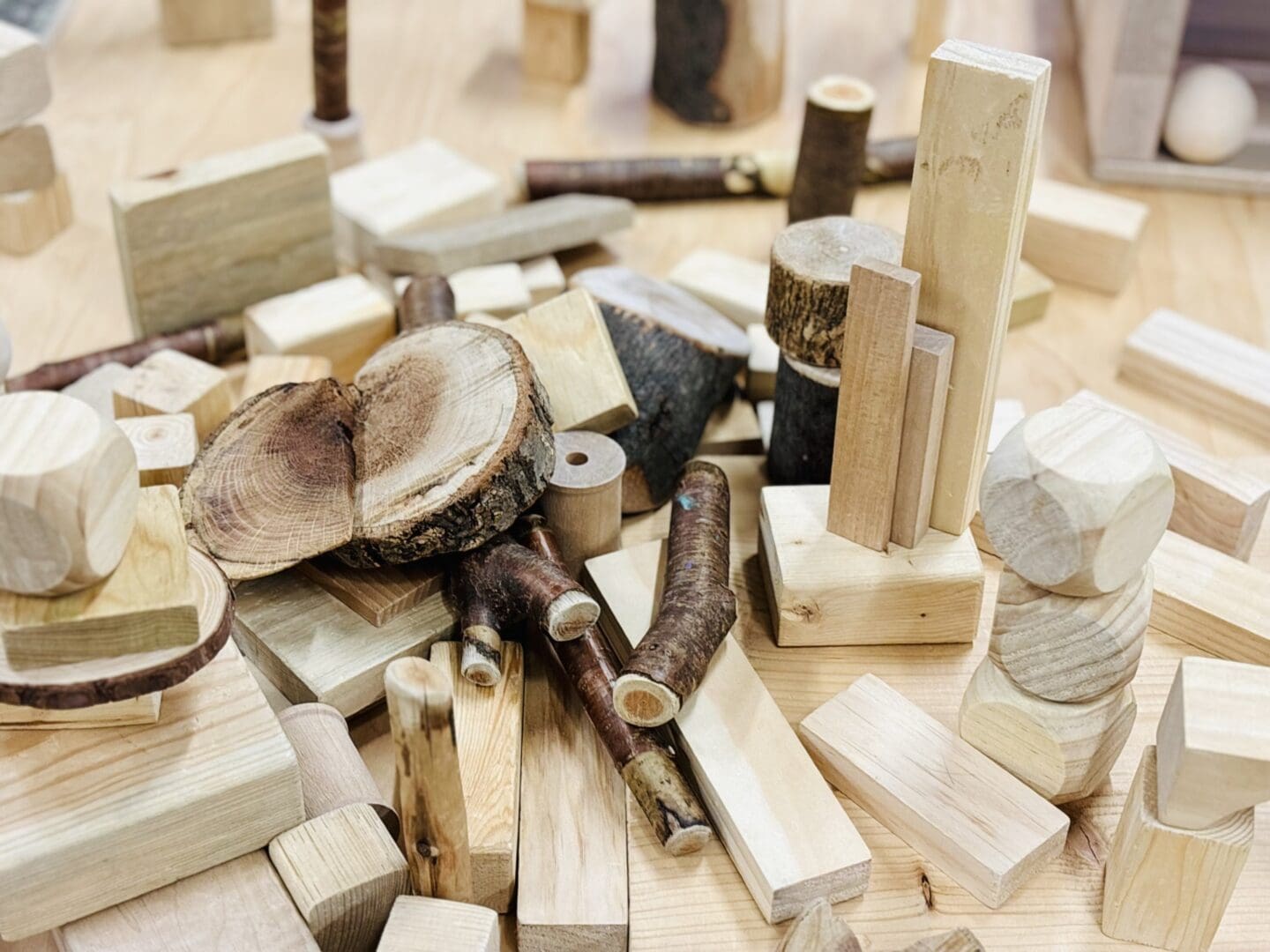 A pile of wooden blocks and wood shavings.